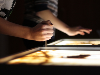 Песочная анимация киностудии "Богослов"